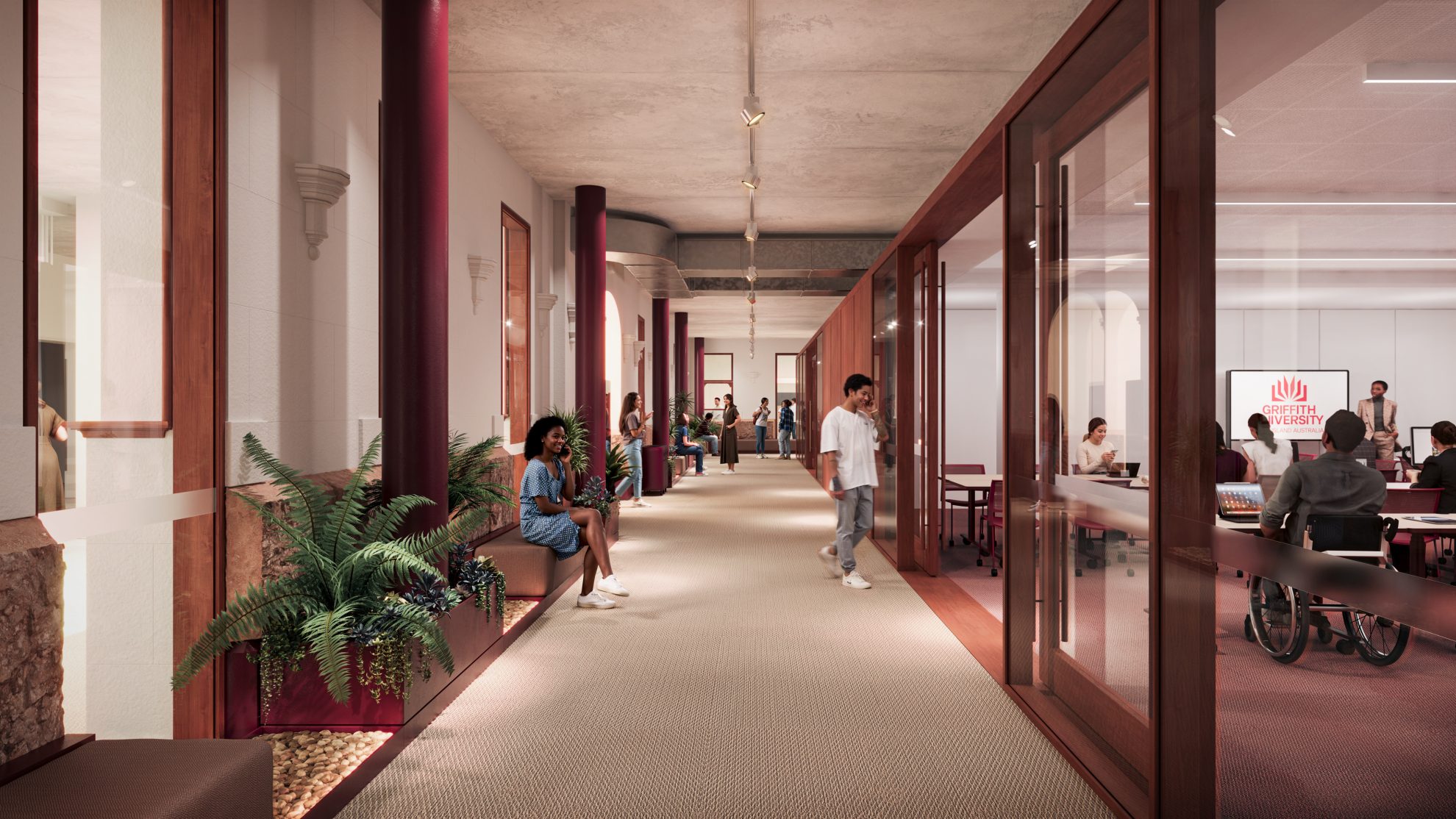 Computer‑generated university hallway with red columns, glass‑walled classroom, indoor plants, and students studying or walking through the space. Includes a visible presentation screen displaying the university logo.